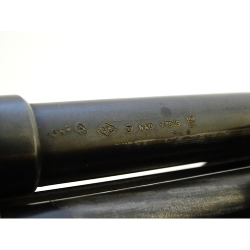 597 - Shotgun: A '500E' .410 pump-action shotgun by Mossberg, USA. 26'' ribless fixed choke barrel with 3'... 