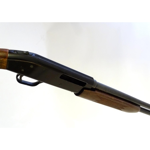 597 - Shotgun: A '500E' .410 pump-action shotgun by Mossberg, USA. 26'' ribless fixed choke barrel with 3'... 