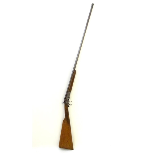 600 - Shotgun: A .410 single barrel sidelever hammergun, of Belgian origin.  29 1/2'' half-octagonal fixed... 