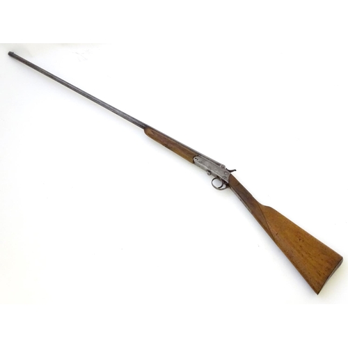 600 - Shotgun: A .410 single barrel sidelever hammergun, of Belgian origin.  29 1/2'' half-octagonal fixed... 