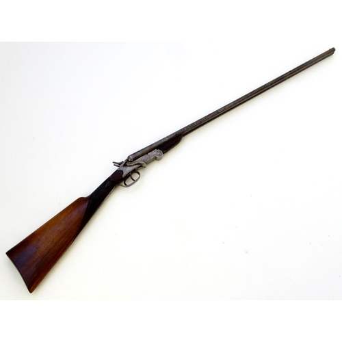 602 - Shotgun: A .410 folding side by side sidelever hammergun, of Belgian origin.  27 1/2'' fixed choke b... 