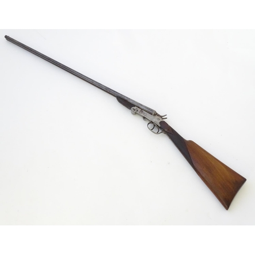 602 - Shotgun: A .410 folding side by side sidelever hammergun, of Belgian origin.  27 1/2'' fixed choke b... 