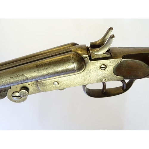 602 - Shotgun: A .410 folding side by side sidelever hammergun, of Belgian origin.  27 1/2'' fixed choke b... 