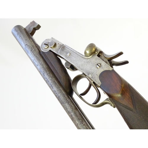 602 - Shotgun: A .410 folding side by side sidelever hammergun, of Belgian origin.  27 1/2'' fixed choke b... 