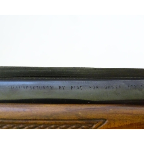 606 - Shotgun: A 12 bore over and under boxlock shotgun by FIAS, Italy for Gower Ltd. 28'' fixed choke bar... 