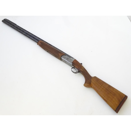 611 - Shotgun: A 'Gold' 12 bore over and under boxlock ejector shotgun by Gamba, Italy. 30'' fixed choke b... 