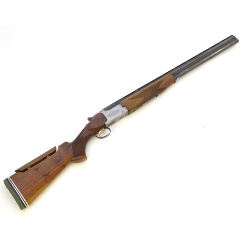 612 - Shotgun: A '6000' 12 bore over and under boxlock ejector shotgun by Miroku, Japan.  28'' fixed choke... 