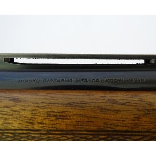 612 - Shotgun: A '6000' 12 bore over and under boxlock ejector shotgun by Miroku, Japan.  28'' fixed choke... 