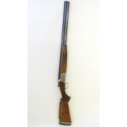 612 - Shotgun: A '6000' 12 bore over and under boxlock ejector shotgun by Miroku, Japan.  28'' fixed choke... 