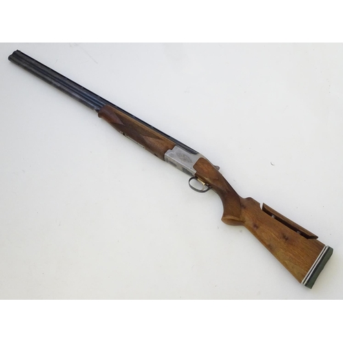 612 - Shotgun: A '6000' 12 bore over and under boxlock ejector shotgun by Miroku, Japan.  28'' fixed choke... 