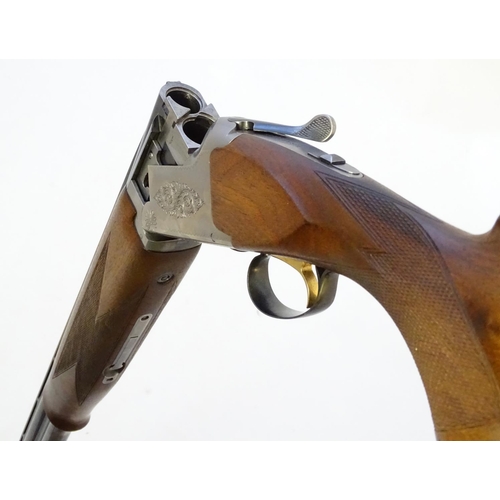 612 - Shotgun: A '6000' 12 bore over and under boxlock ejector shotgun by Miroku, Japan.  28'' fixed choke... 