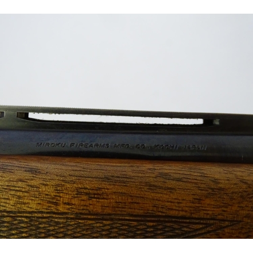 612 - Shotgun: A '6000' 12 bore over and under boxlock ejector shotgun by Miroku, Japan.  28'' fixed choke... 