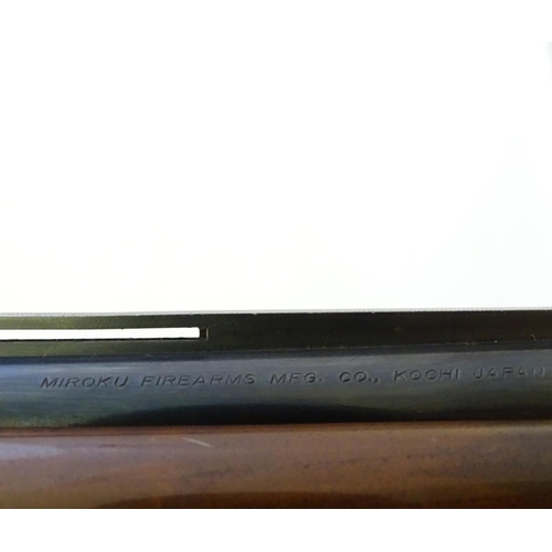 613 - Shotgun: An 'MK60' 20 bore over and under boxlock ejector shotgun by Miroku, Japan. 30'' fixed choke... 