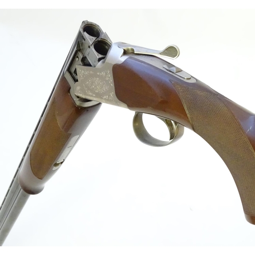 613 - Shotgun: An 'MK60' 20 bore over and under boxlock ejector shotgun by Miroku, Japan. 30'' fixed choke... 