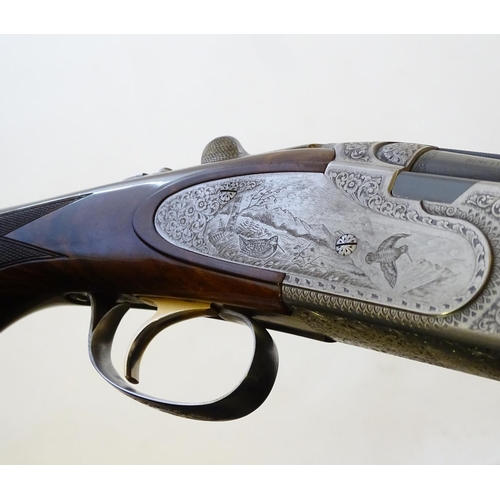 614 - Shotgun: A cased 'S687 EELL Diamond Pigeon' 20 bore over and under sidelock ejector shotgun by P Ber... 