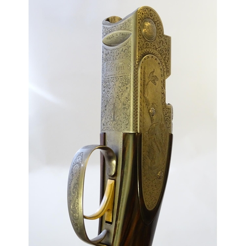 614 - Shotgun: A cased 'S687 EELL Diamond Pigeon' 20 bore over and under sidelock ejector shotgun by P Ber... 