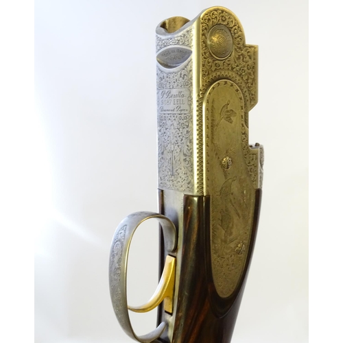 614 - Shotgun: A cased 'S687 EELL Diamond Pigeon' 20 bore over and under sidelock ejector shotgun by P Ber... 