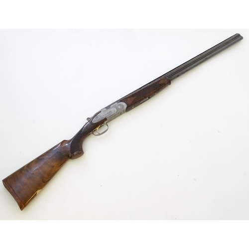 614 - Shotgun: A cased 'S687 EELL Diamond Pigeon' 20 bore over and under sidelock ejector shotgun by P Ber... 