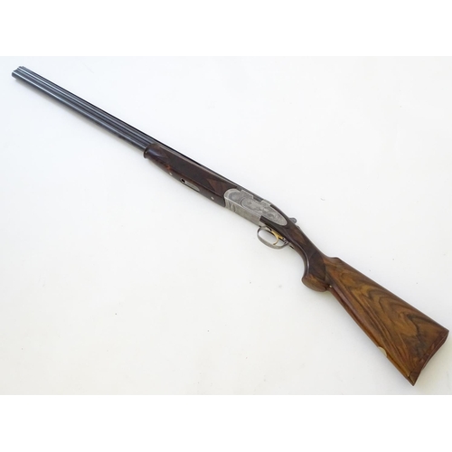 614 - Shotgun: A cased 'S687 EELL Diamond Pigeon' 20 bore over and under sidelock ejector shotgun by P Ber... 