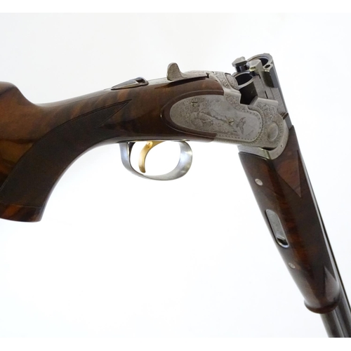 614 - Shotgun: A cased 'S687 EELL Diamond Pigeon' 20 bore over and under sidelock ejector shotgun by P Ber... 