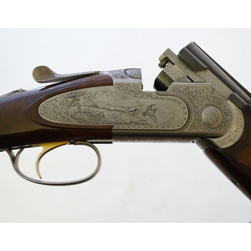 614 - Shotgun: A cased 'S687 EELL Diamond Pigeon' 20 bore over and under sidelock ejector shotgun by P Ber... 