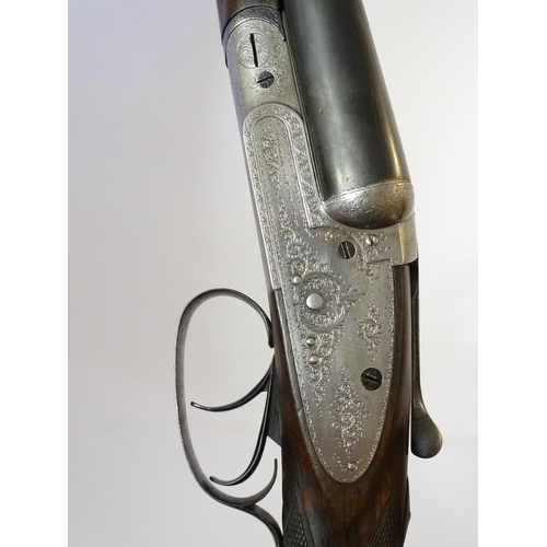 619 - Shotgun: A 12 bore side by side sidelock shotgun by Joseph Lang & Son, London. 28'' fixed choke slee... 