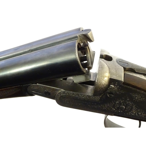 619 - Shotgun: A 12 bore side by side sidelock shotgun by Joseph Lang & Son, London. 28'' fixed choke slee... 