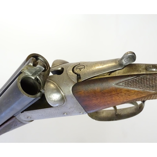 620 - Shotgun: A 12 bore side by side boxlock ejector shotgun by Westley Richards & Co, Birmingham & Londo... 