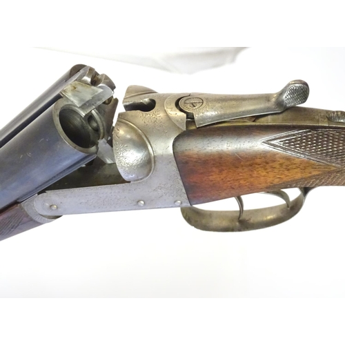 620 - Shotgun: A 12 bore side by side boxlock ejector shotgun by Westley Richards & Co, Birmingham & Londo... 