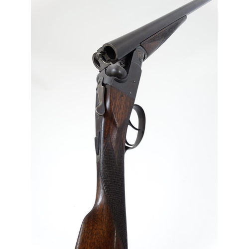 624 - Shotgun : A 12 bore side by side boxlock by BSA , Birmingham . 30'' fixedchoke barrels with tapered ... 