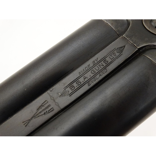 624 - Shotgun : A 12 bore side by side boxlock by BSA , Birmingham . 30'' fixedchoke barrels with tapered ... 