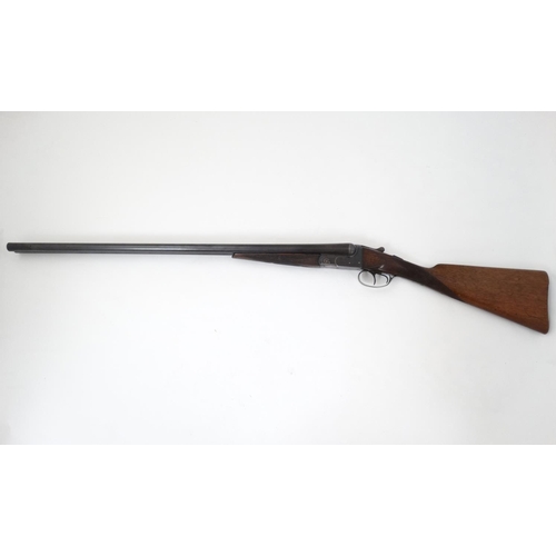 624 - Shotgun : A 12 bore side by side boxlock by BSA , Birmingham . 30'' fixedchoke barrels with tapered ... 