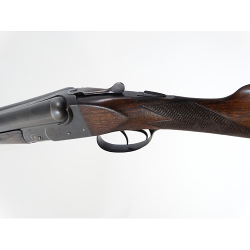 624 - Shotgun : A 12 bore side by side boxlock by BSA , Birmingham . 30'' fixedchoke barrels with tapered ... 