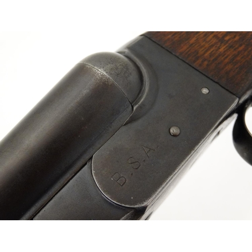 624 - Shotgun : A 12 bore side by side boxlock by BSA , Birmingham . 30'' fixedchoke barrels with tapered ... 