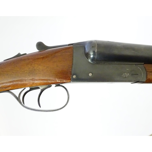 625 - Shotgun: A 12 bore side by side boxlock shotgun by Miguel Larranaga, Spain. 28'' fixed choke barrels... 