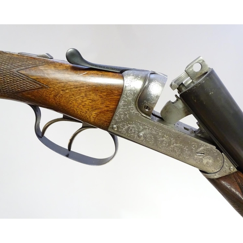 627 - Shotguns: A composed-matched pair of 'Avant Tout' 12 bore side by side boxlock ejector shotguns by C... 