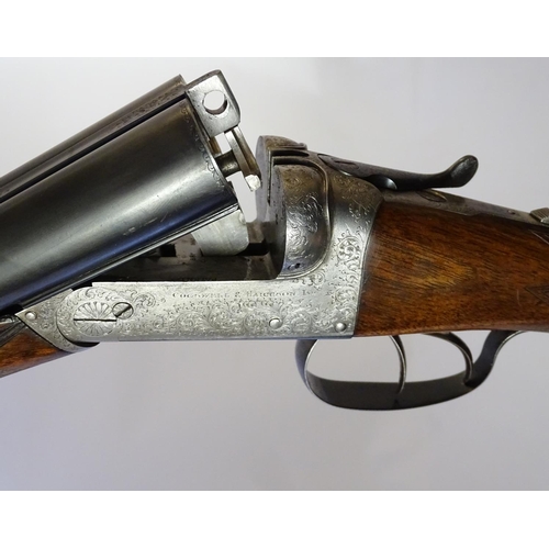 627 - Shotguns: A composed-matched pair of 'Avant Tout' 12 bore side by side boxlock ejector shotguns by C... 