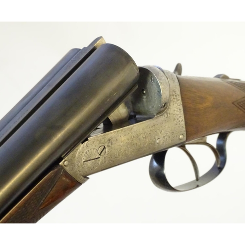 627 - Shotguns: A composed-matched pair of 'Avant Tout' 12 bore side by side boxlock ejector shotguns by C... 