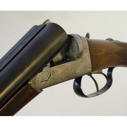 627 - Shotguns: A composed-matched pair of 'Avant Tout' 12 bore side by side boxlock ejector shotguns by C... 