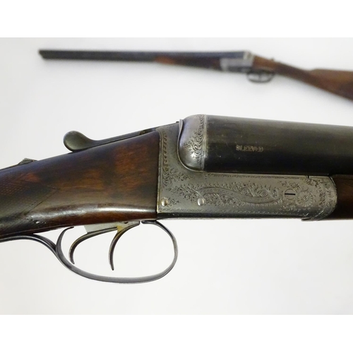 627 - Shotguns: A composed-matched pair of 'Avant Tout' 12 bore side by side boxlock ejector shotguns by C... 