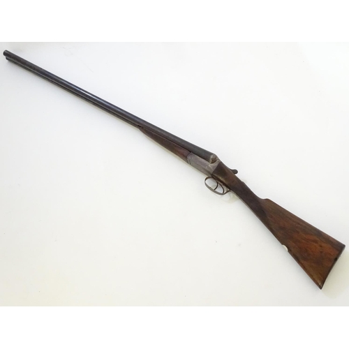 629 - Shotgun: An early 12 bore side by side boxlock shotgun by Charles (Chas) Hellis, London. 30 1/4'' fi... 