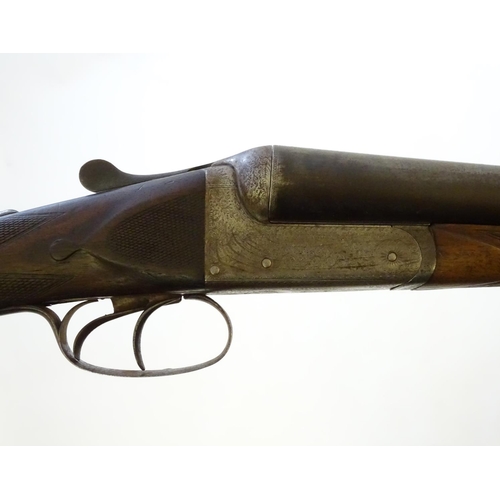 629 - Shotgun: An early 12 bore side by side boxlock shotgun by Charles (Chas) Hellis, London. 30 1/4'' fi... 