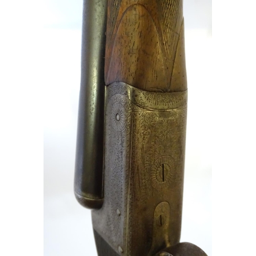 629 - Shotgun: An early 12 bore side by side boxlock shotgun by Charles (Chas) Hellis, London. 30 1/4'' fi... 