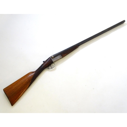 630 - Shotgun: A 20 bore side by side boxlock shotgun, of Belgian origin. 27 3/4'' fixed choke barrels wit... 