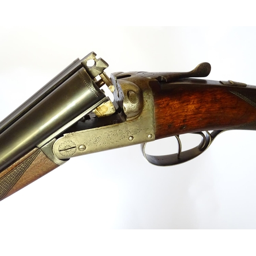 630 - Shotgun: A 20 bore side by side boxlock shotgun, of Belgian origin. 27 3/4'' fixed choke barrels wit... 