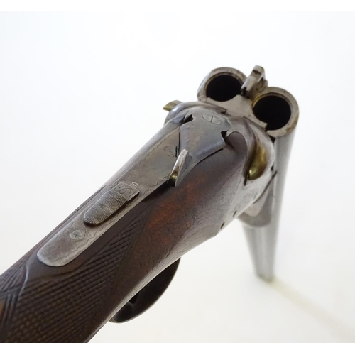 630 - Shotgun: A 20 bore side by side boxlock shotgun, of Belgian origin. 27 3/4'' fixed choke barrels wit... 