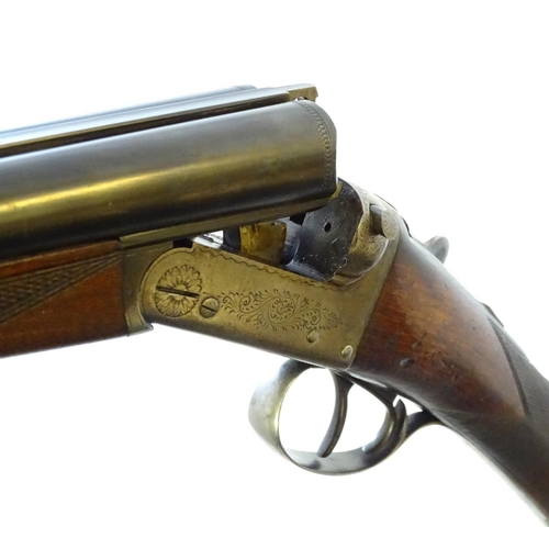 630 - Shotgun: A 20 bore side by side boxlock shotgun, of Belgian origin. 27 3/4'' fixed choke barrels wit... 