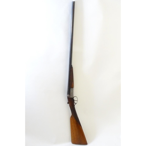 630 - Shotgun: A 20 bore side by side boxlock shotgun, of Belgian origin. 27 3/4'' fixed choke barrels wit... 