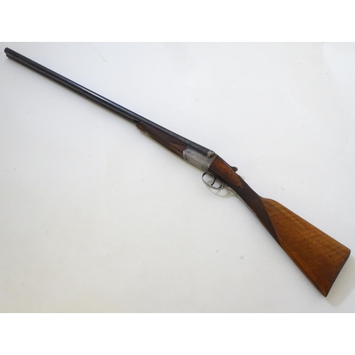 630 - Shotgun: A 20 bore side by side boxlock shotgun, of Belgian origin. 27 3/4'' fixed choke barrels wit... 