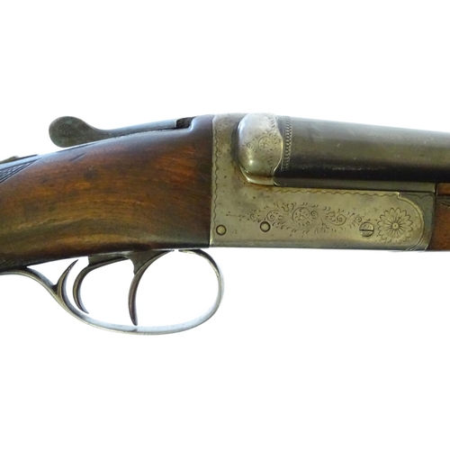 630 - Shotgun: A 20 bore side by side boxlock shotgun, of Belgian origin. 27 3/4'' fixed choke barrels wit... 